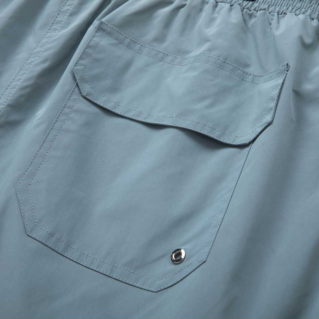 Amiri Core Logo Swim Shorts Dusty Blue - DopestKickz