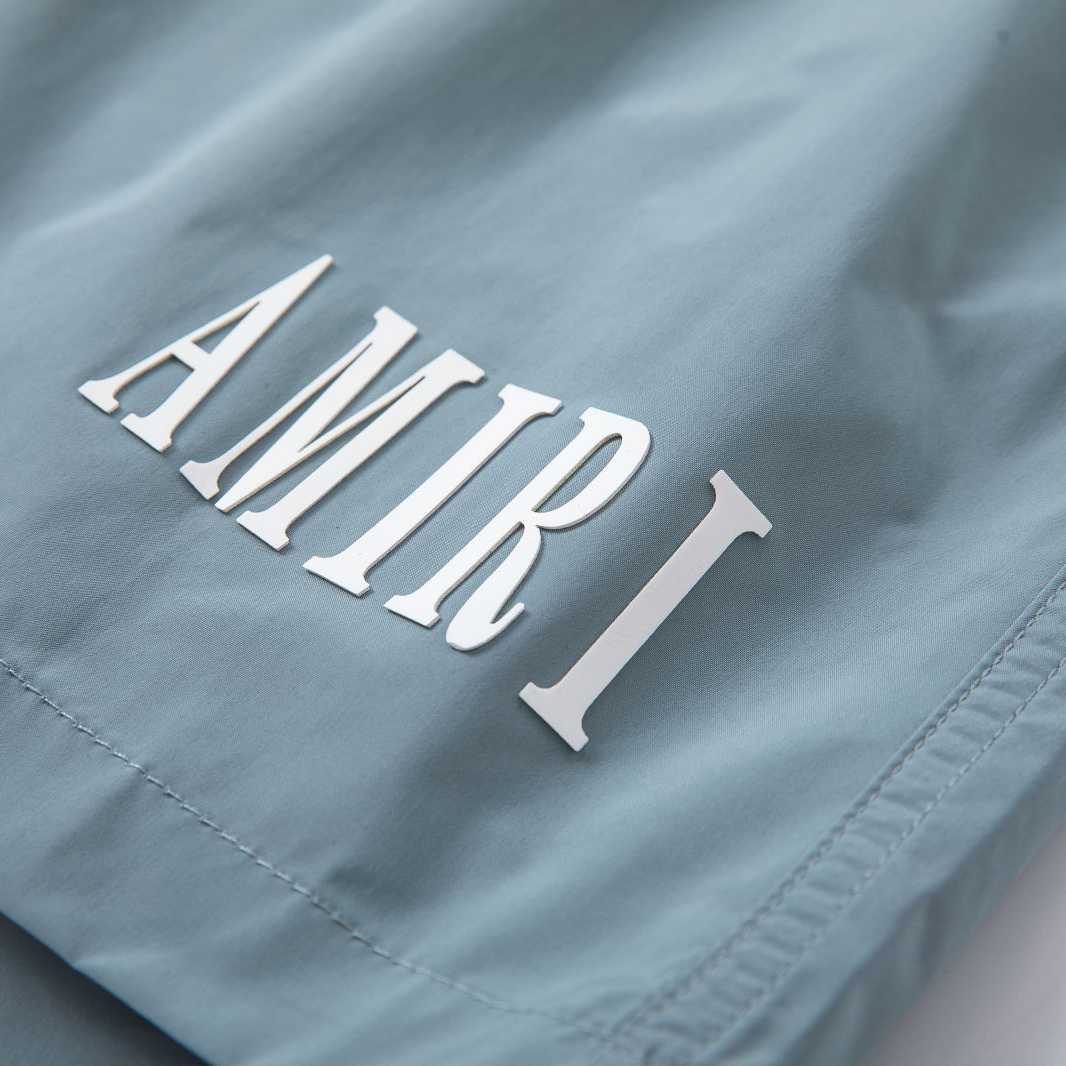 Amiri Core Logo Swim Shorts Dusty Blue - DopestKickz