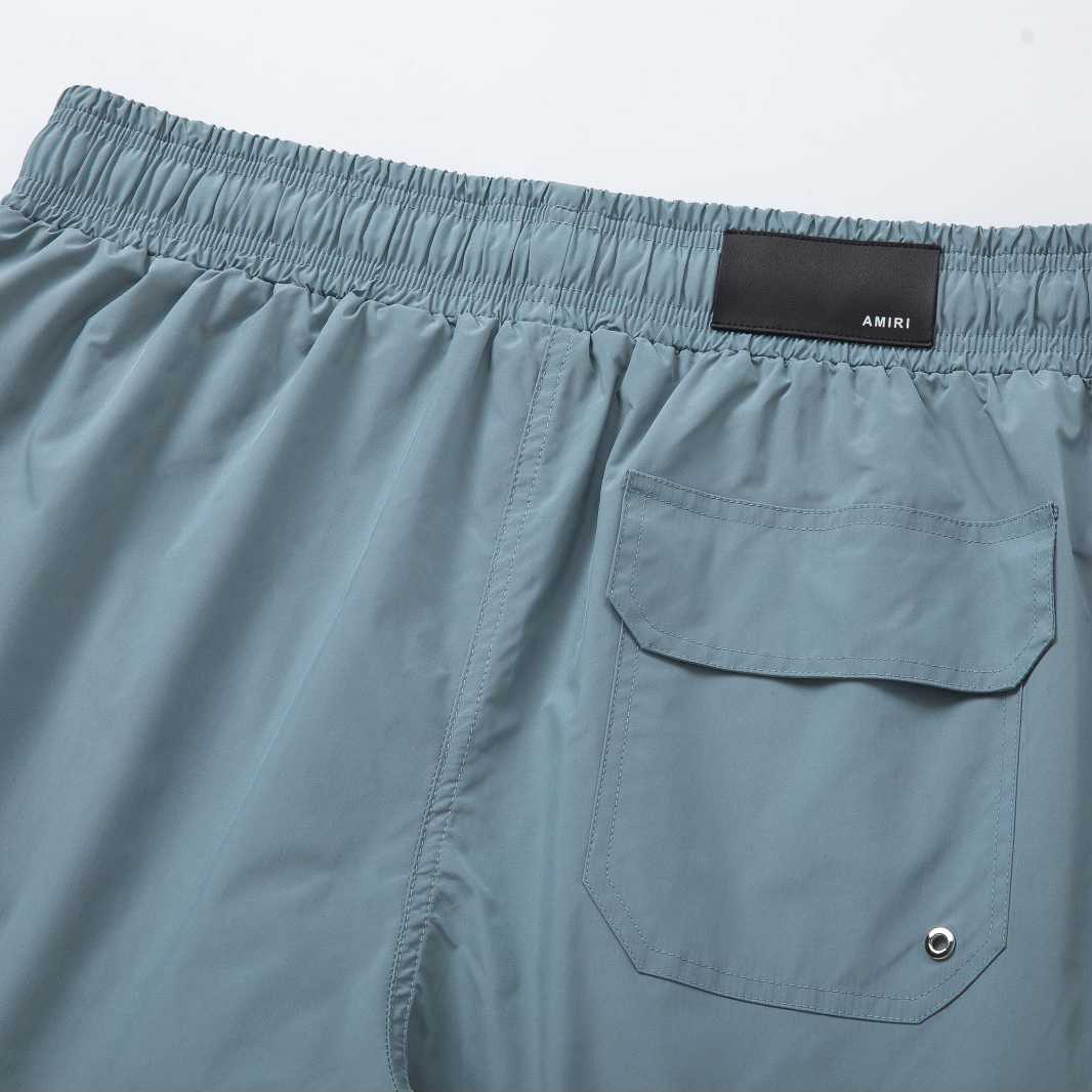 Amiri Core Logo Swim Shorts Dusty Blue - DopestKickz