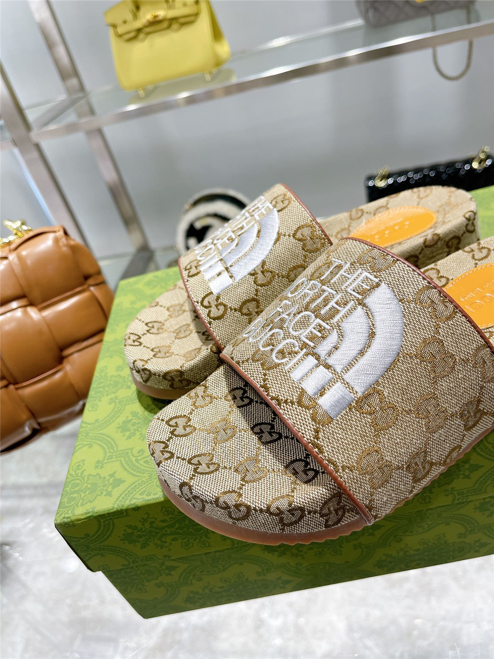 Gucci X The North Face GG Logo Slides - DopestKickz