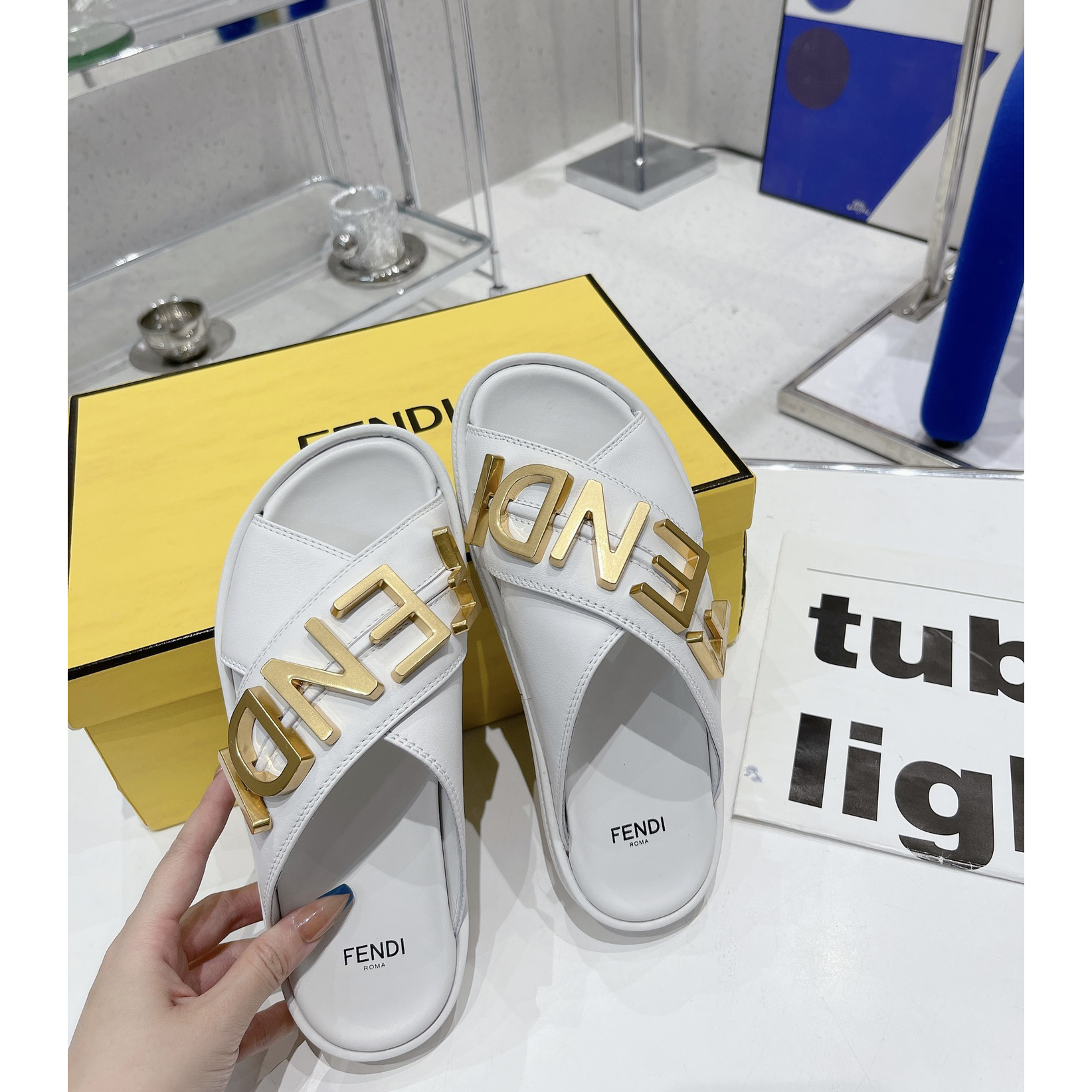 Fendi Graphy White Leather Slides - DopestKickz