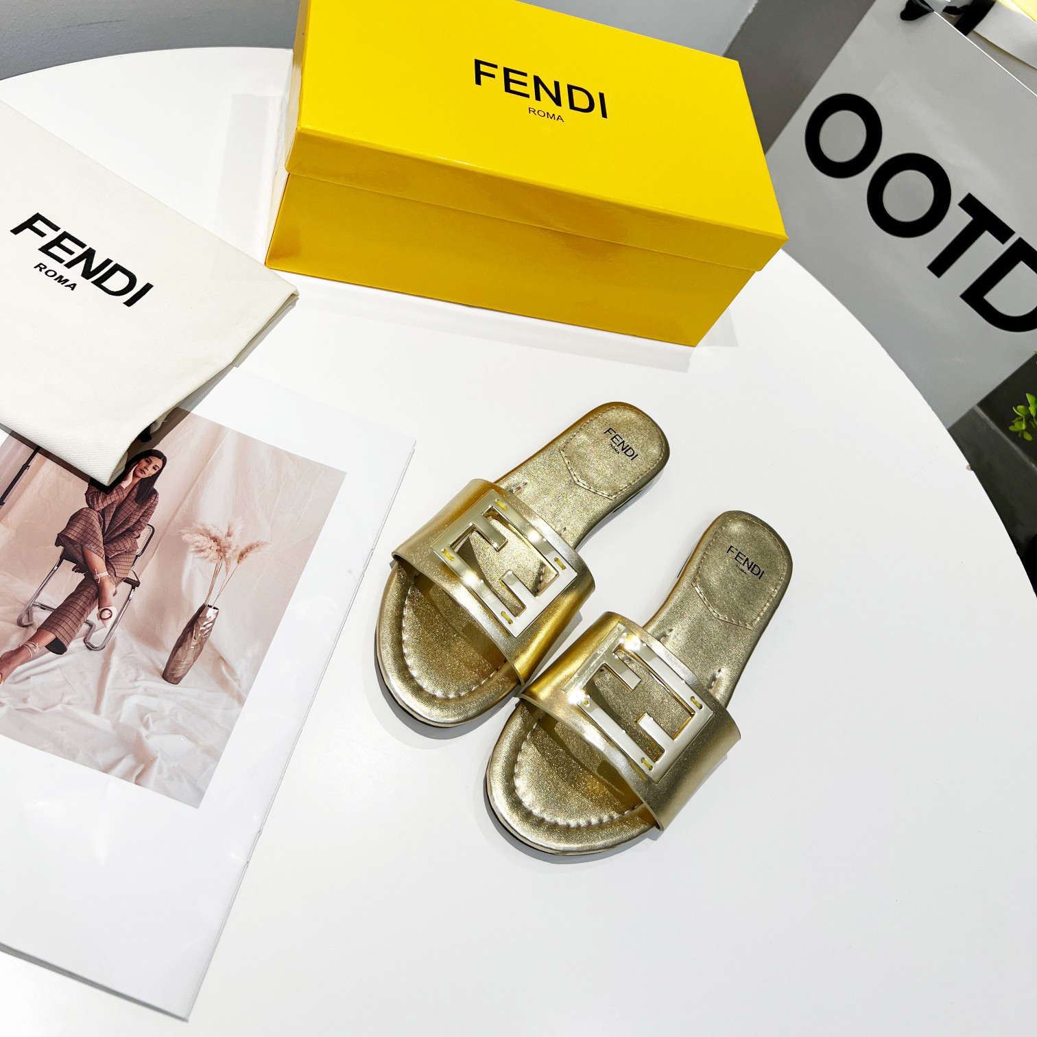 Fendi Baguette Gold nappa leather slides - DopestKickz