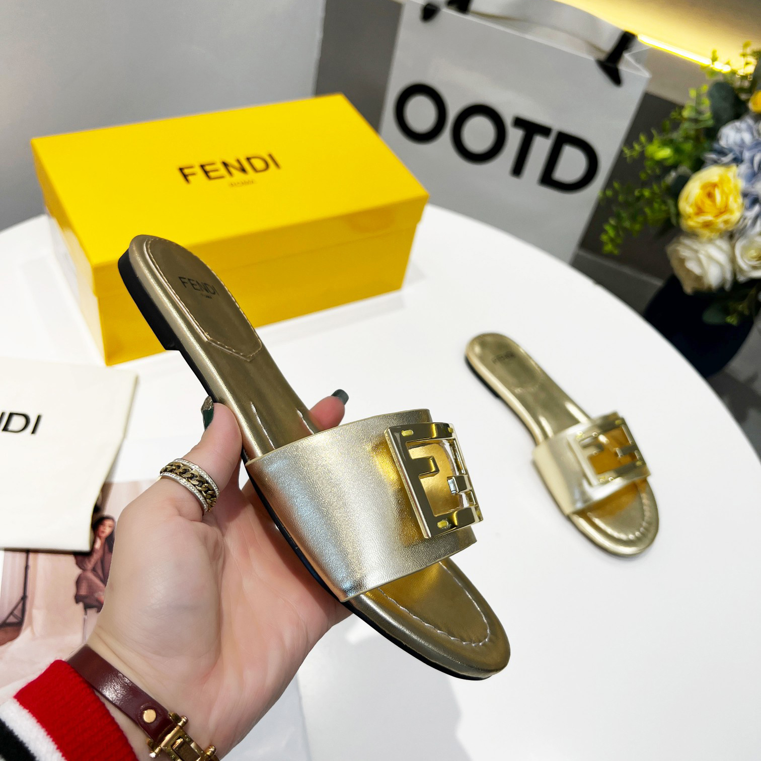 Fendi Baguette Gold nappa leather slides - DopestKickz