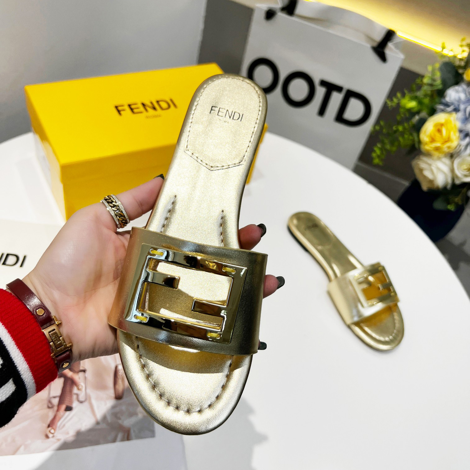 Fendi Baguette Gold nappa leather slides - DopestKickz