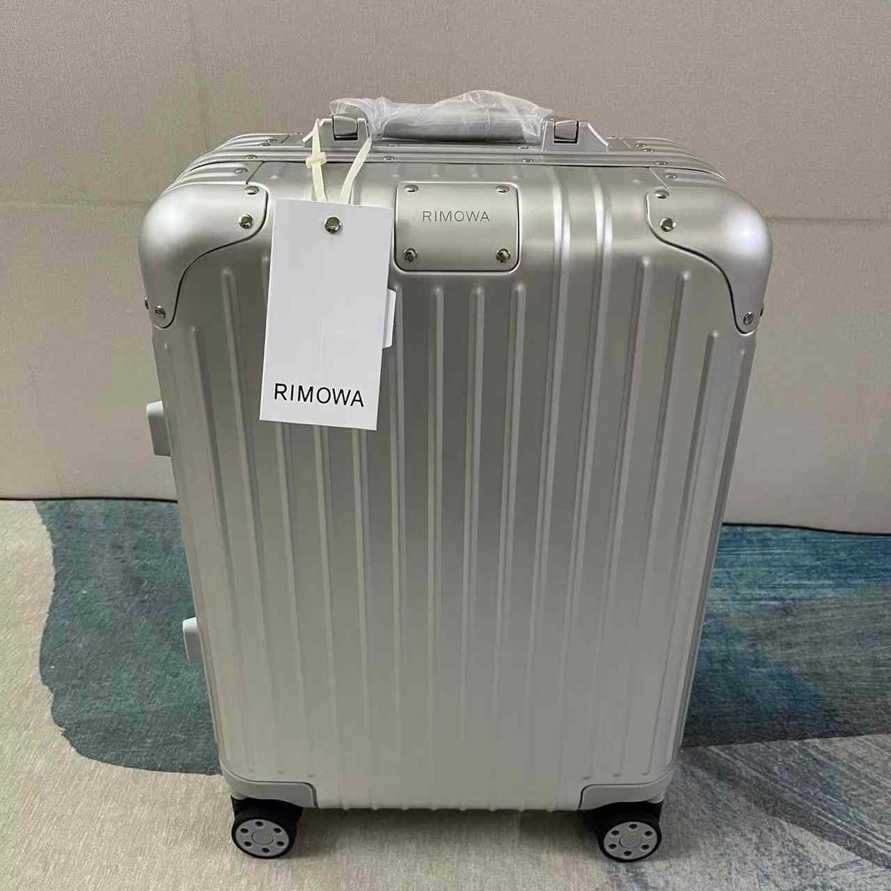 Rimowa Luggage Size 20 - DopestKickz
