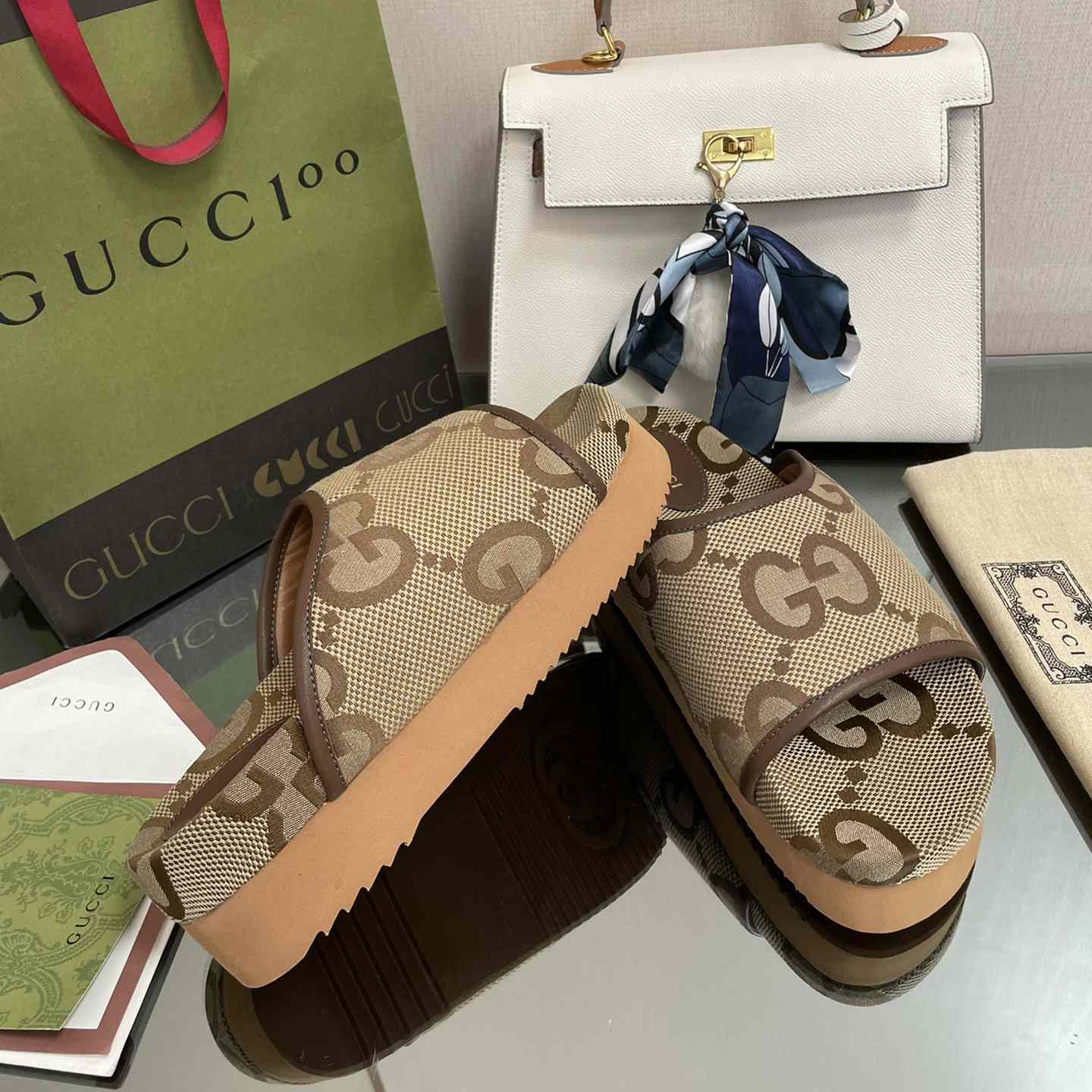 Gucci Women's Jumbo GG Platform Slide - DopestKickz
