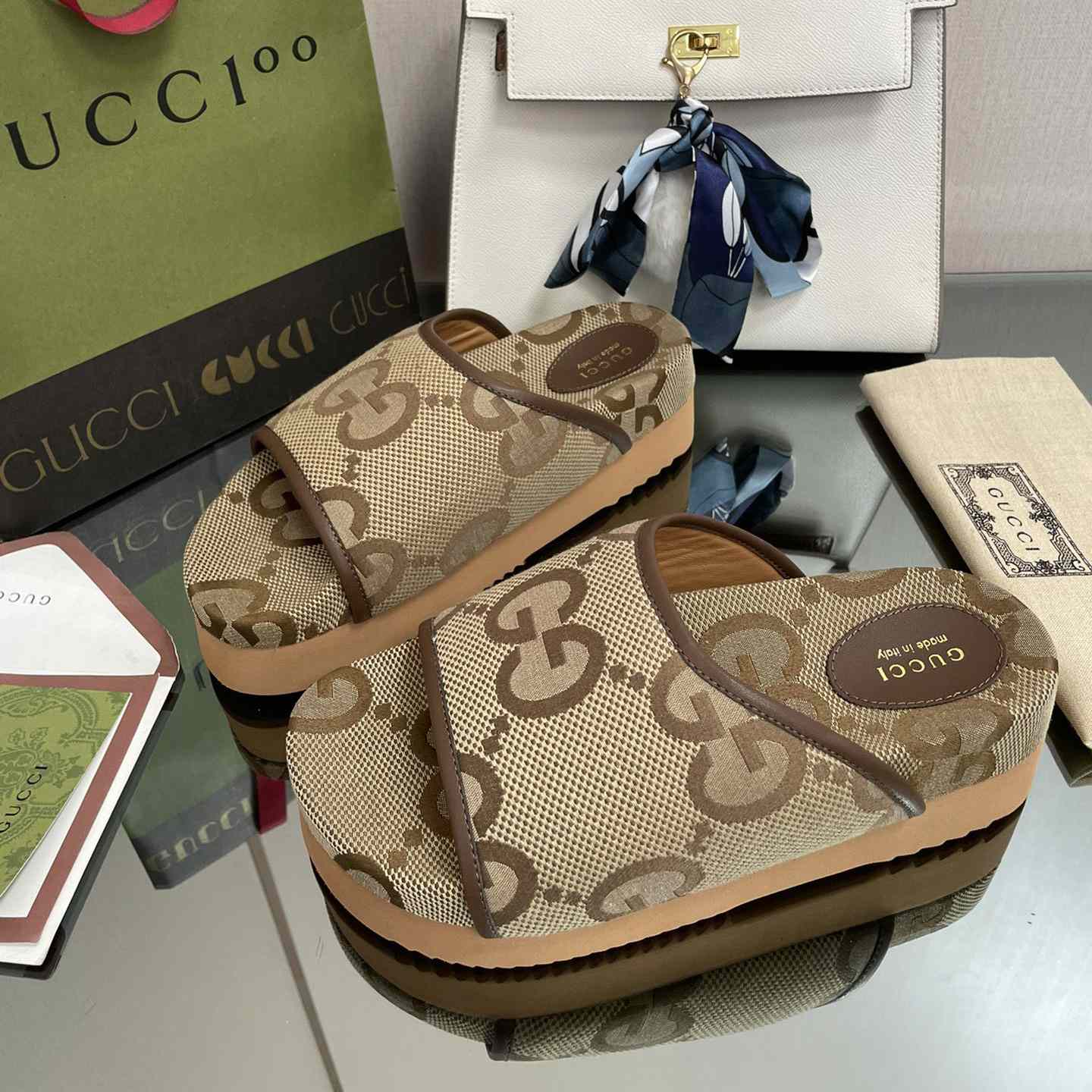 Gucci Women's Jumbo GG Platform Slide - DopestKickz