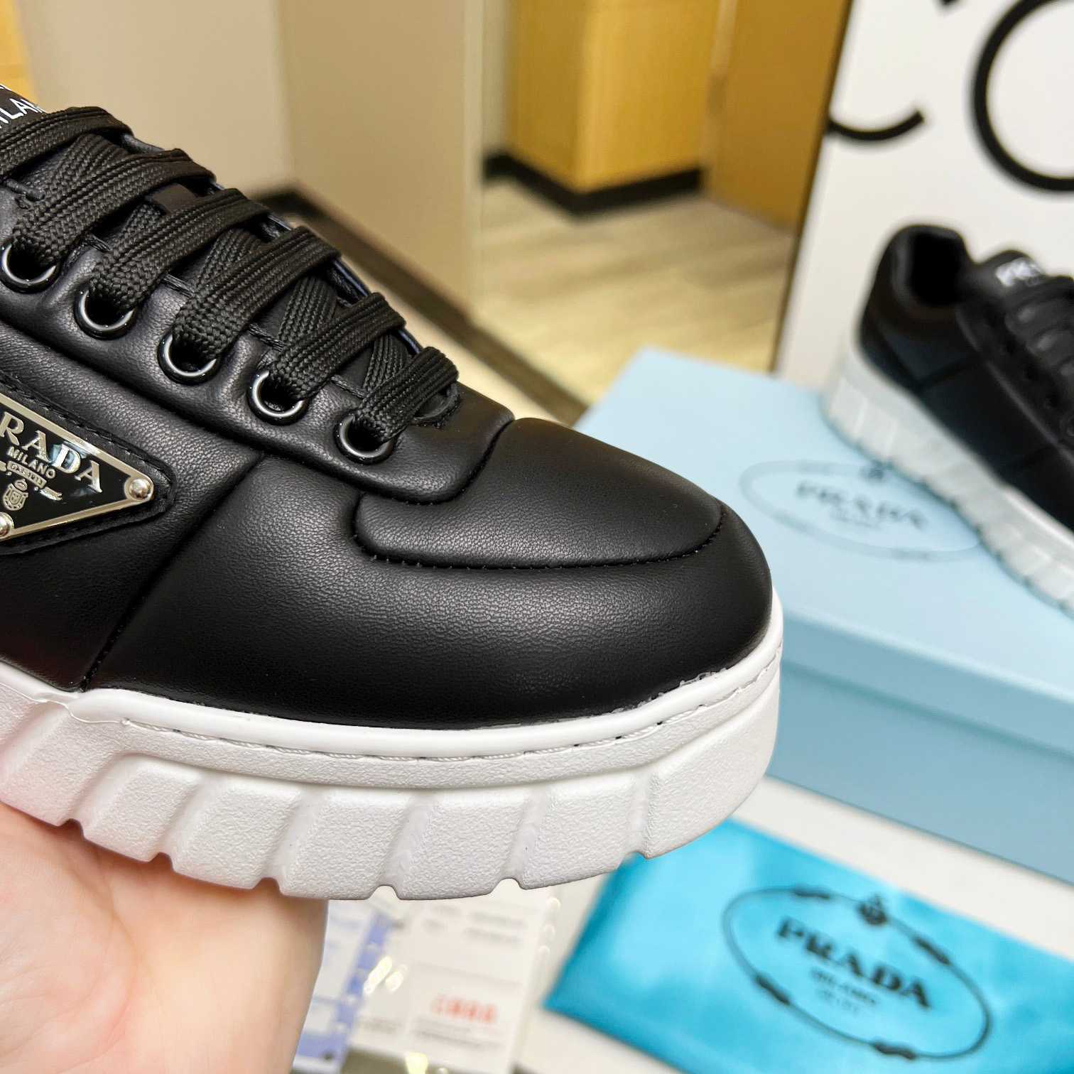 Prada Padded Nappa Leather Sneakers - DopestKickz