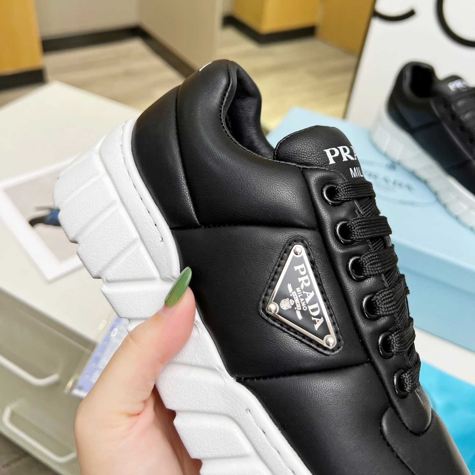 Prada Padded Nappa Leather Sneakers - DopestKickz