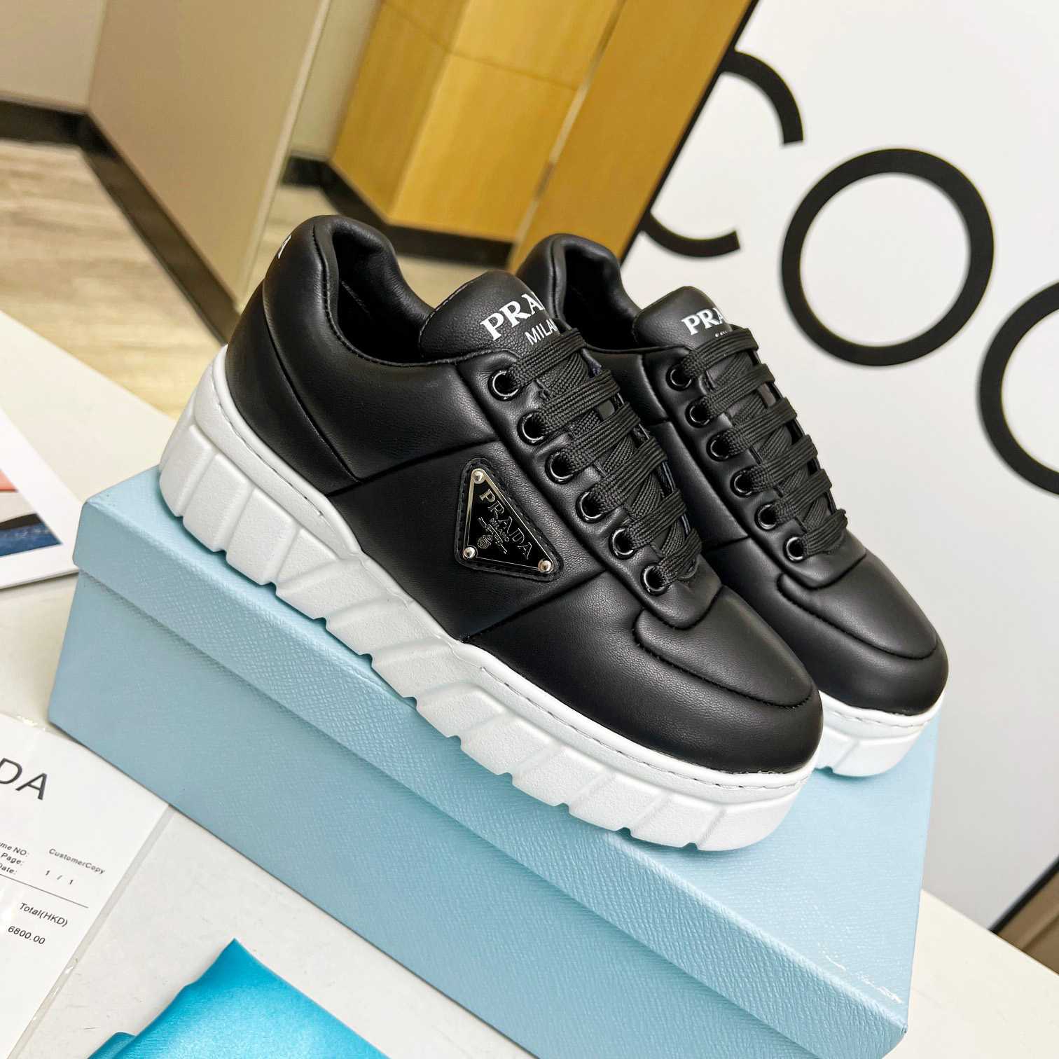 Prada Padded Nappa Leather Sneakers - DopestKickz