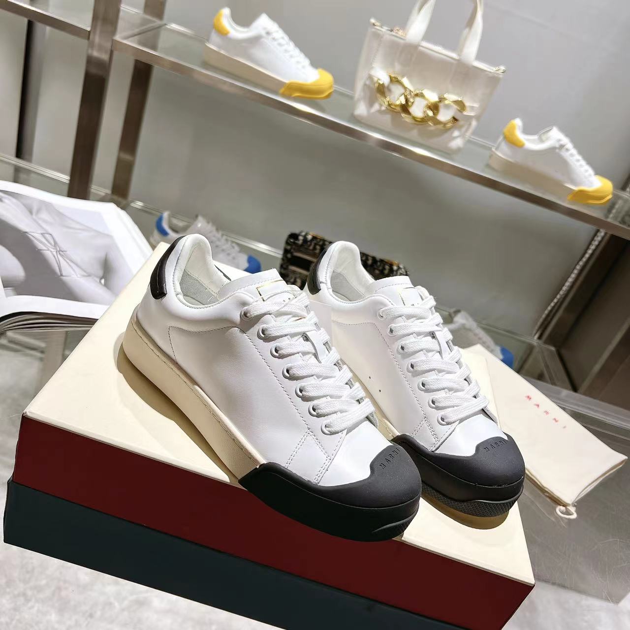 Marni Dada Bumper Sneaker In White And Black Leather - DopestKickz