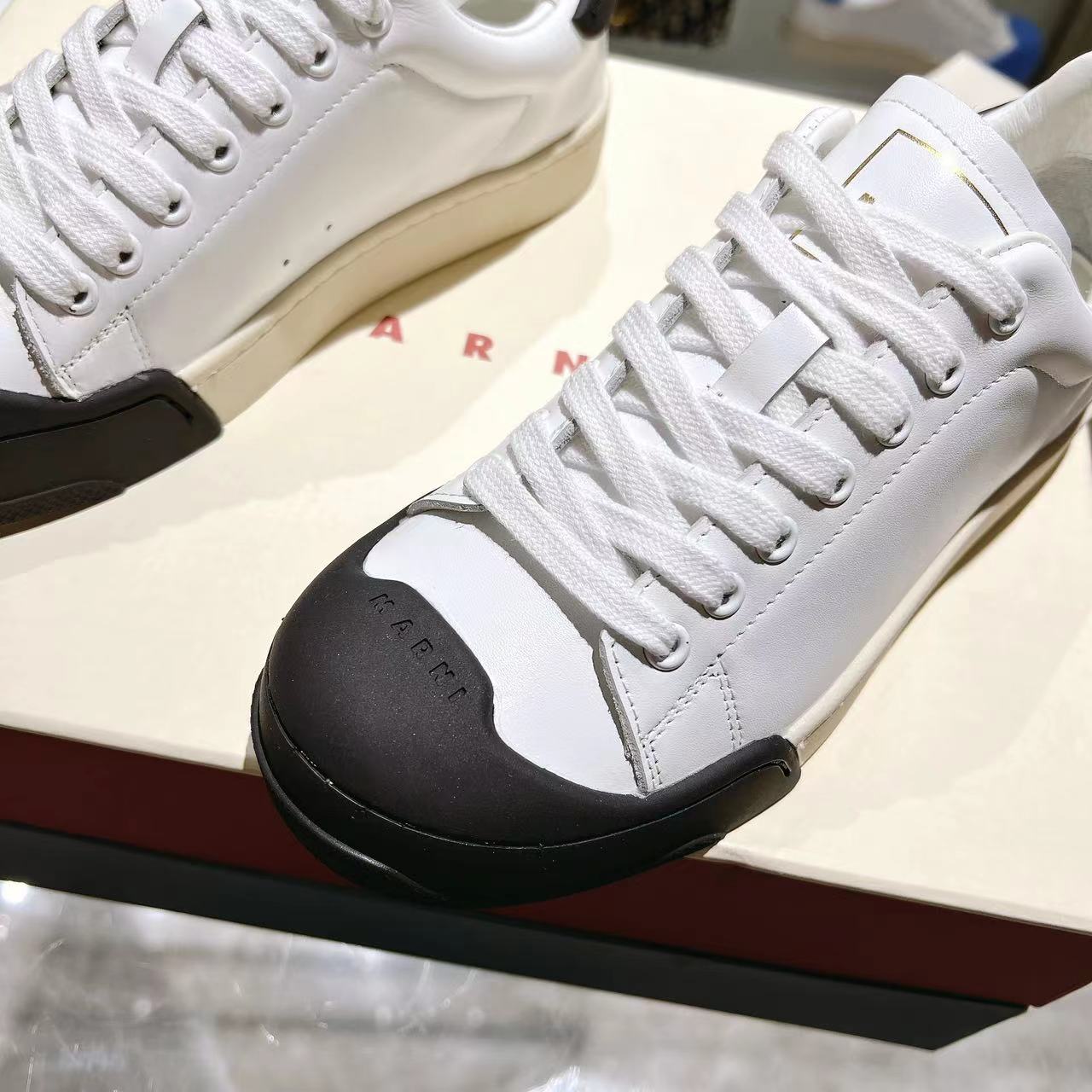Marni Dada Bumper Sneaker In White And Black Leather - DopestKickz