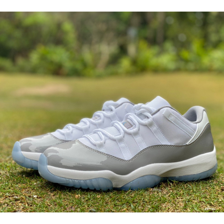 Air Jordan 11 Retro Low "Cement Grev" Sneaker     av2187-140 - DopestKickz