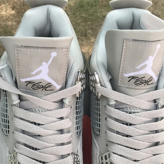 Air Jordan 4 WMNS “Frozen Moments” Sneakers  AQ9129-001  - DopestKickz