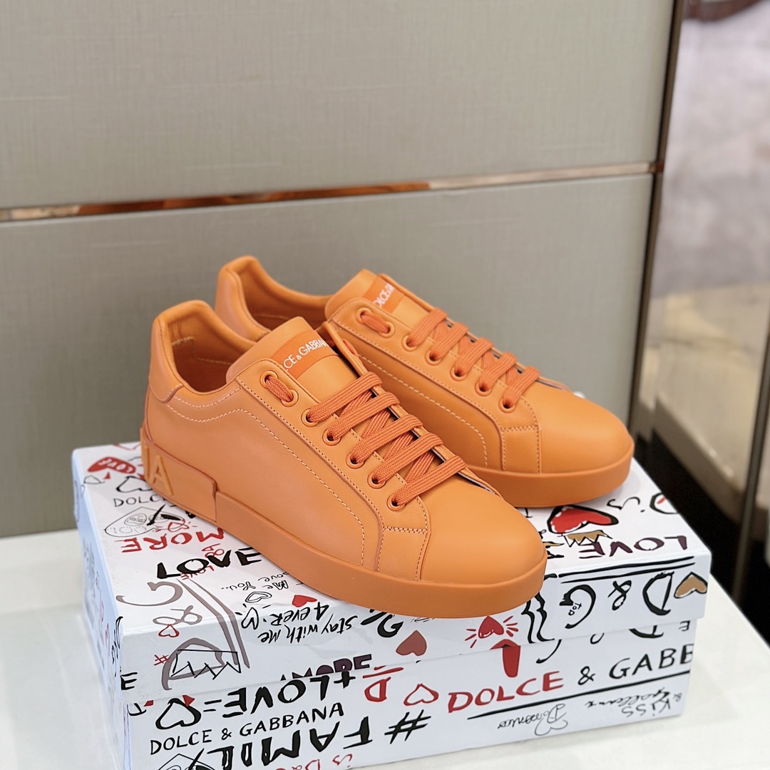 Dolce & Gabbana Embossed Logo Sneakers - DopestKickz