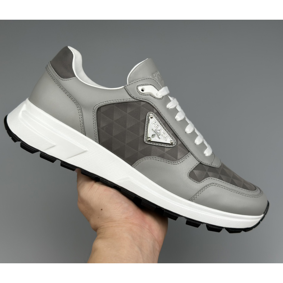 Prada Leather And Re-Nylon High-top Sneakers - DopestKickz