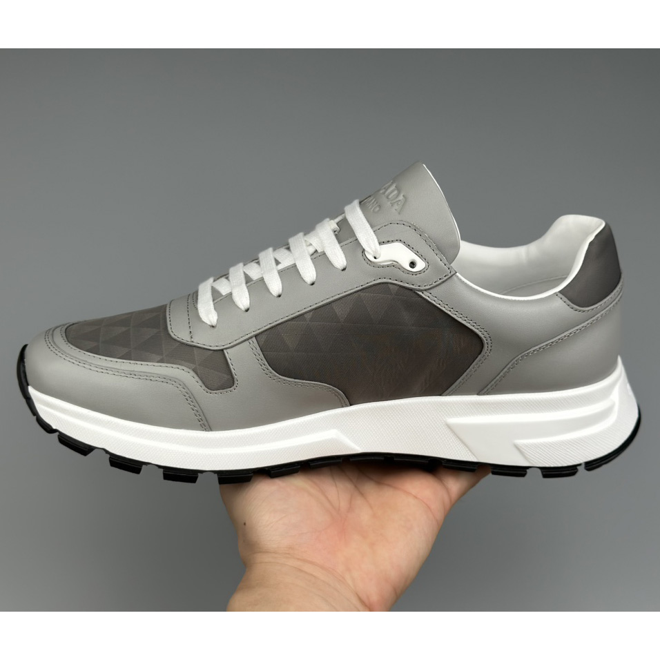 Prada Leather And Re-Nylon High-top Sneakers - DopestKickz