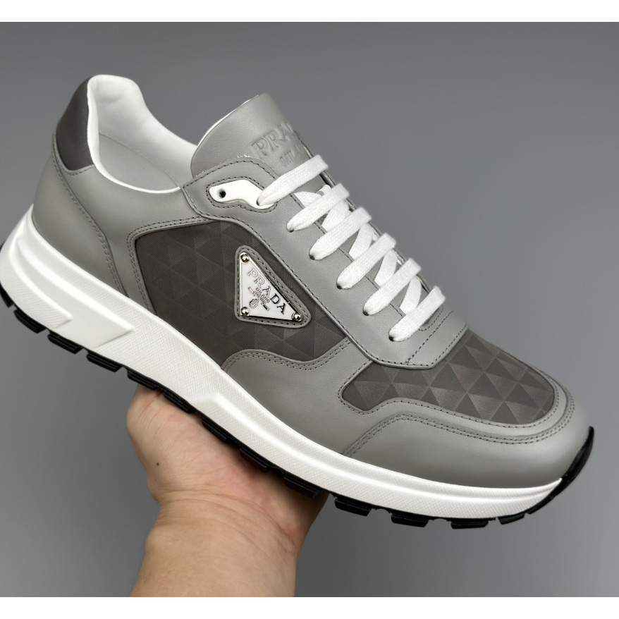 Prada Leather And Re-Nylon High-top Sneakers - DopestKickz