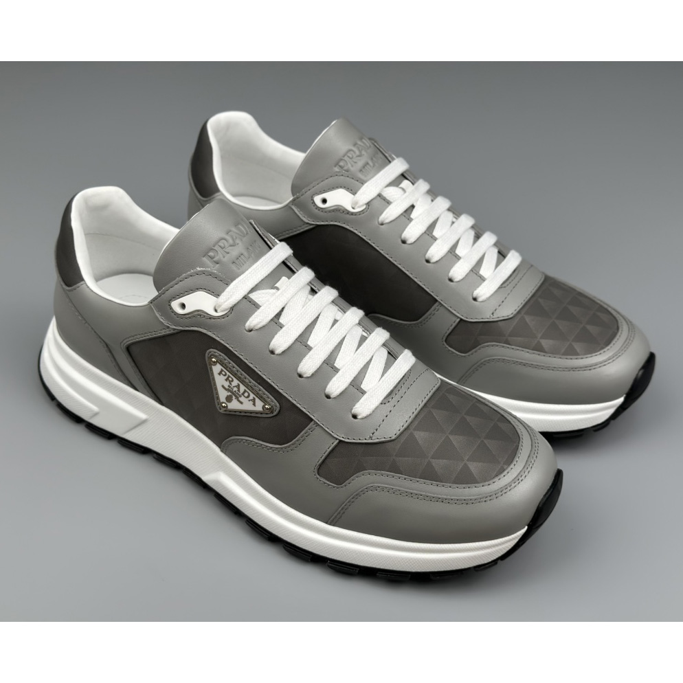 Prada Leather And Re-Nylon High-top Sneakers - DopestKickz