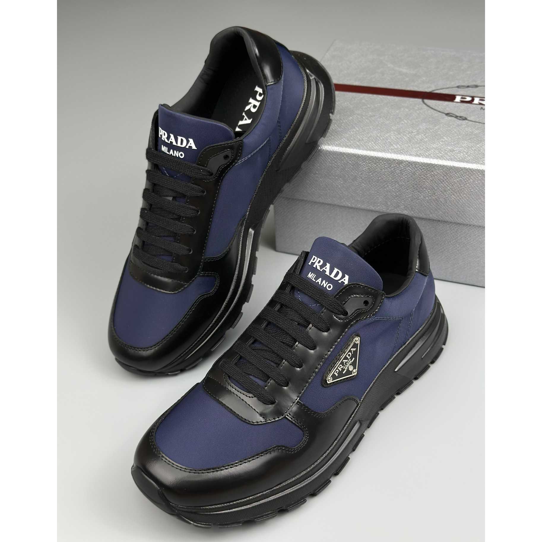 Prada Re-Nylon And Brushed Leather Sneakers - DopestKickz