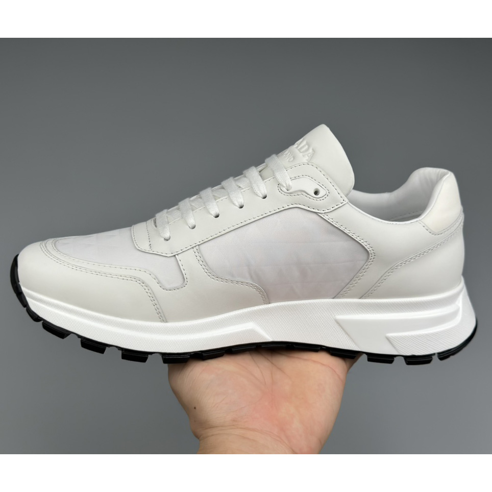 Prada Leather And Re-Nylon High-top Sneakers - DopestKickz