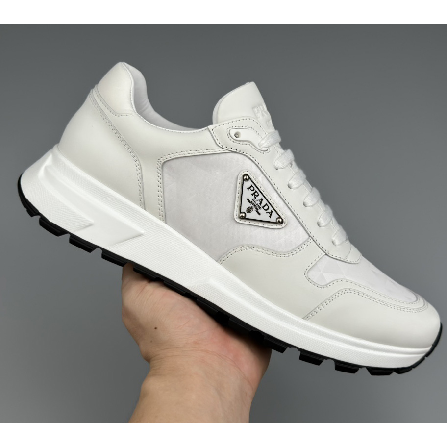 Prada Leather And Re-Nylon High-top Sneakers - DopestKickz