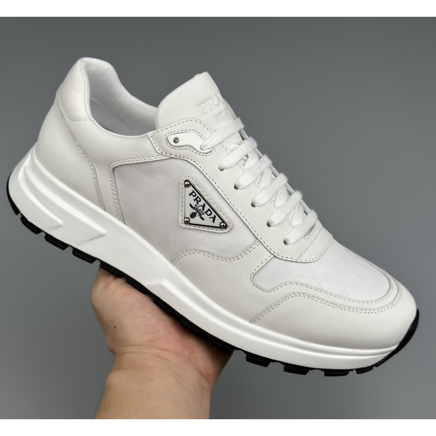 Prada Leather And Re-Nylon High-top Sneakers - DopestKickz