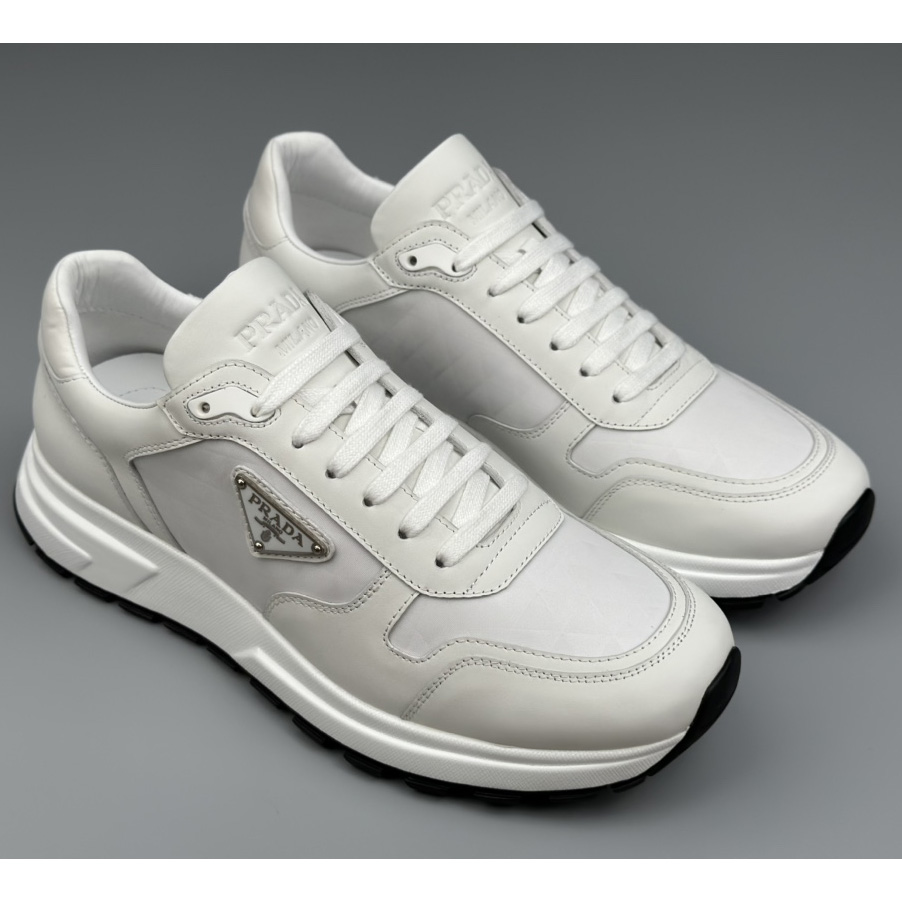 Prada Leather And Re-Nylon High-top Sneakers - DopestKickz