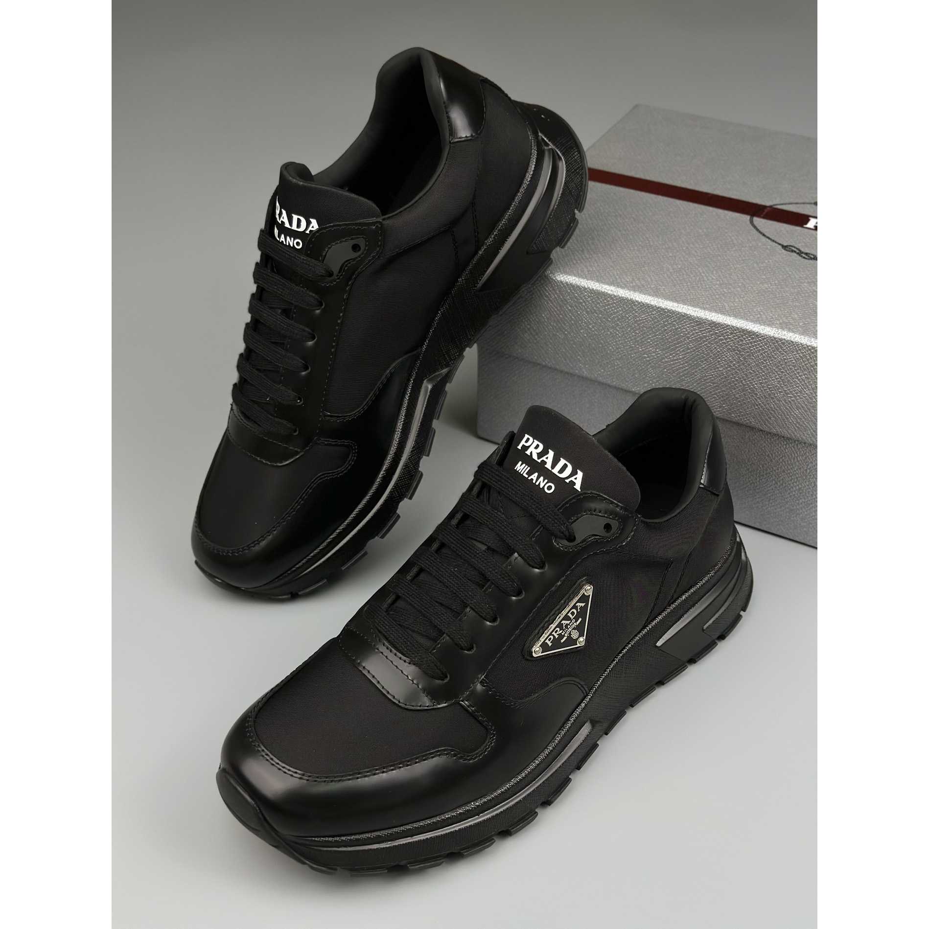 Prada Re-Nylon And Brushed Leather Sneakers - DopestKickz
