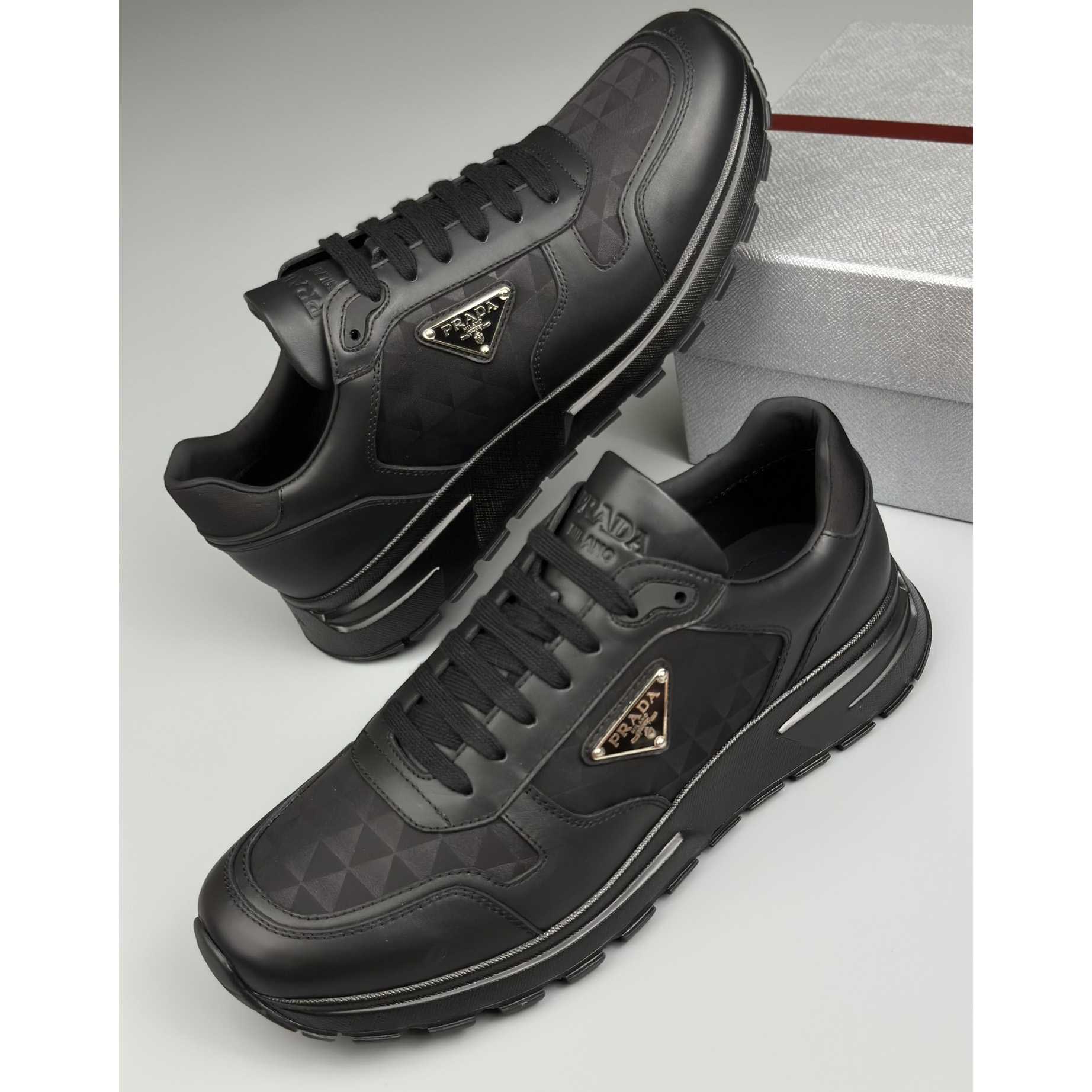 Prada Leather And Re-Nylon High-top Sneakers - DopestKickz
