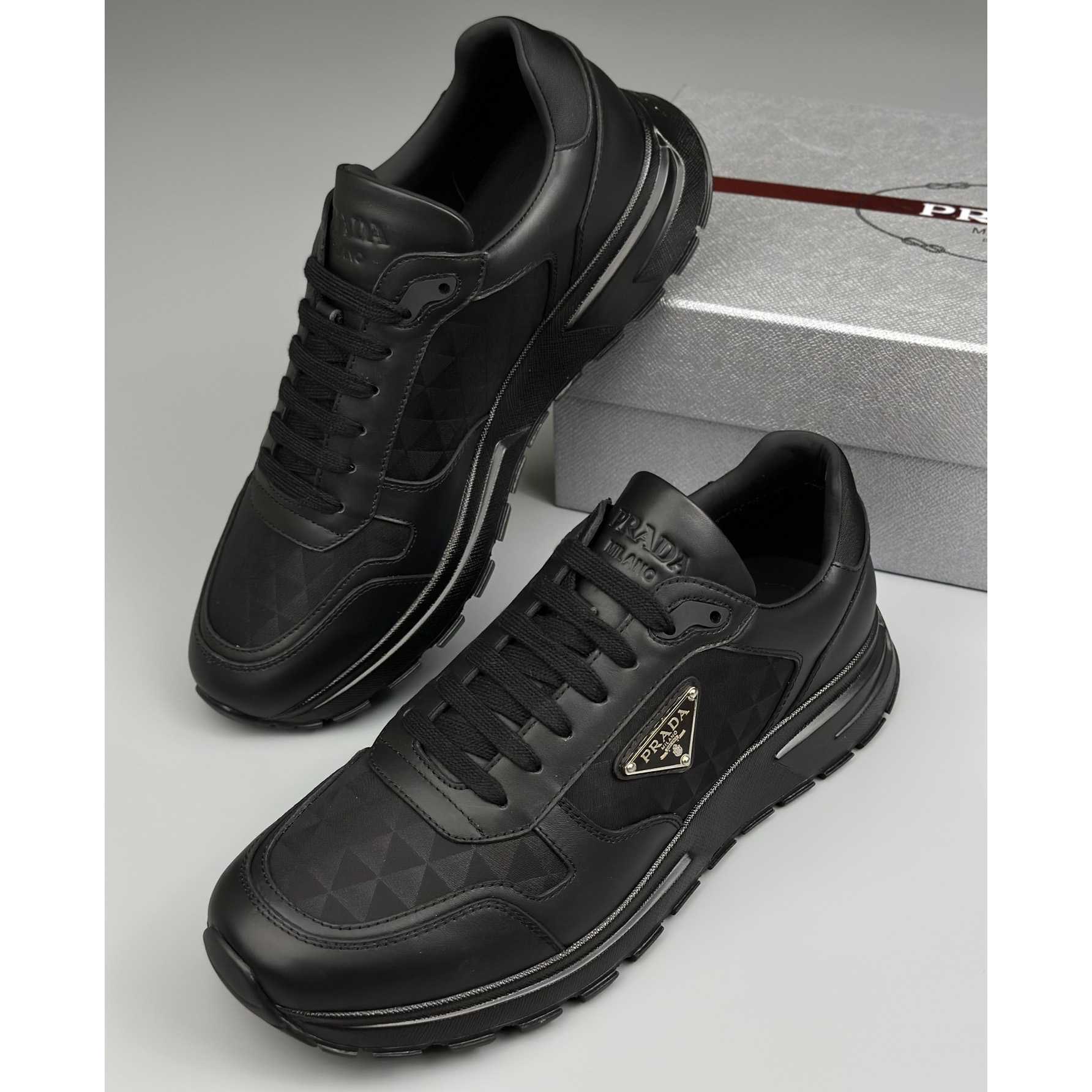 Prada Leather And Re-Nylon High-top Sneakers - DopestKickz