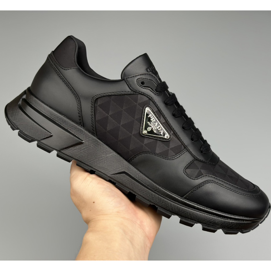 Prada Leather And Re-Nylon High-top Sneakers - DopestKickz