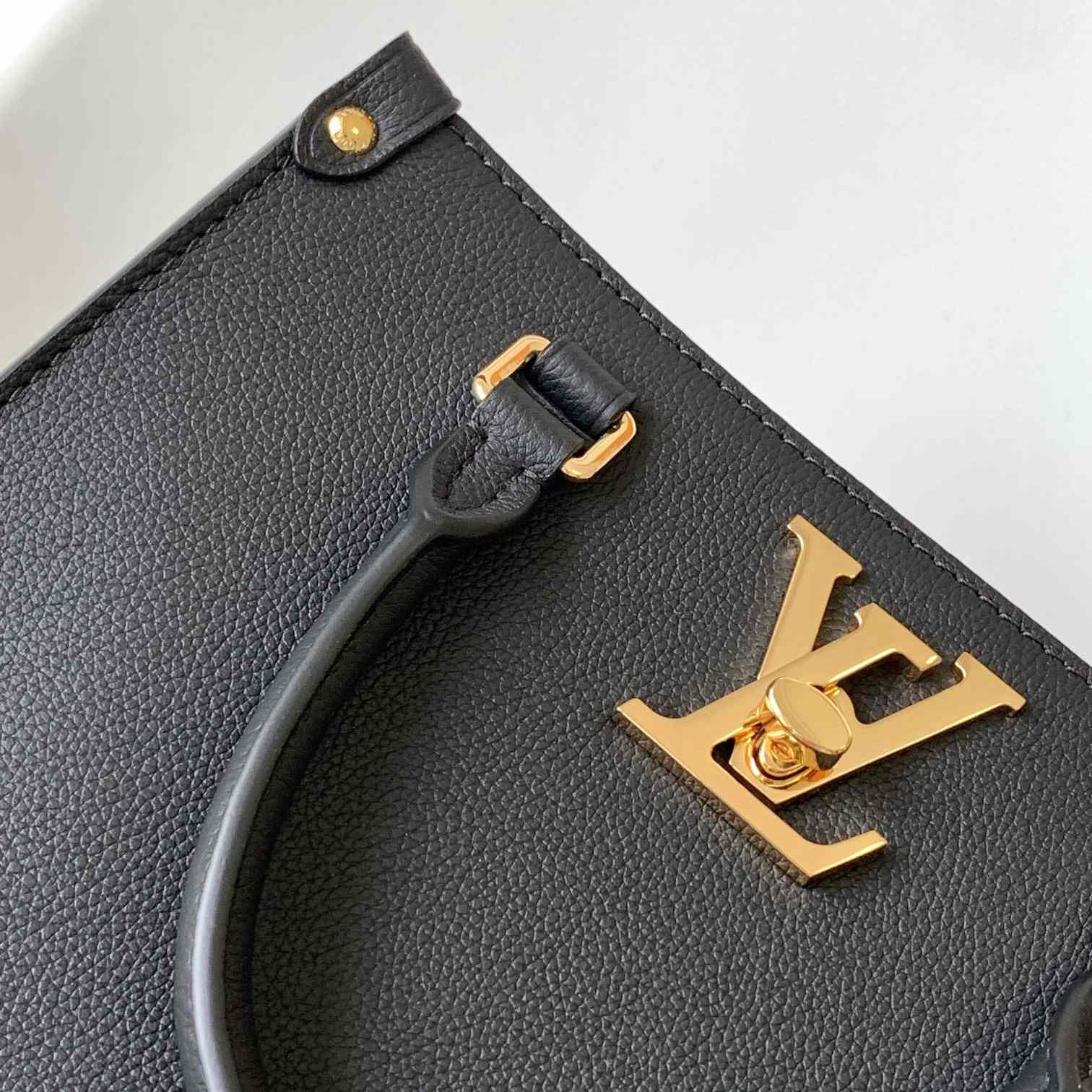Louis Vuitton Lock & Go Handbag    M22311 - DopestKickz