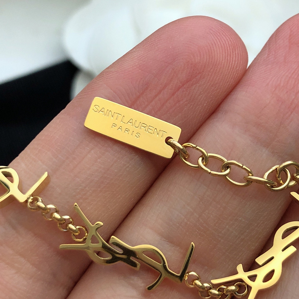 Saint Laurent Cassandre Multi-charm Bracelet In Metal - DopestKickz