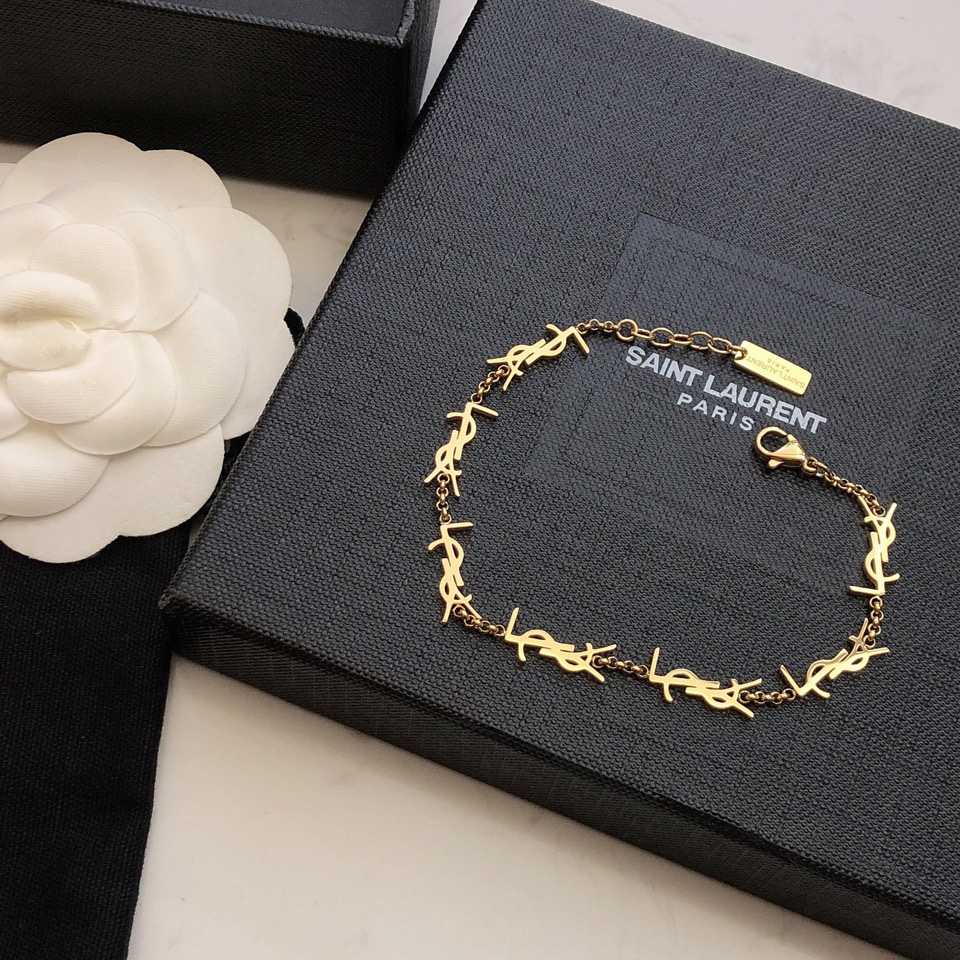 Saint Laurent Cassandre Multi-charm Bracelet In Metal - DopestKickz