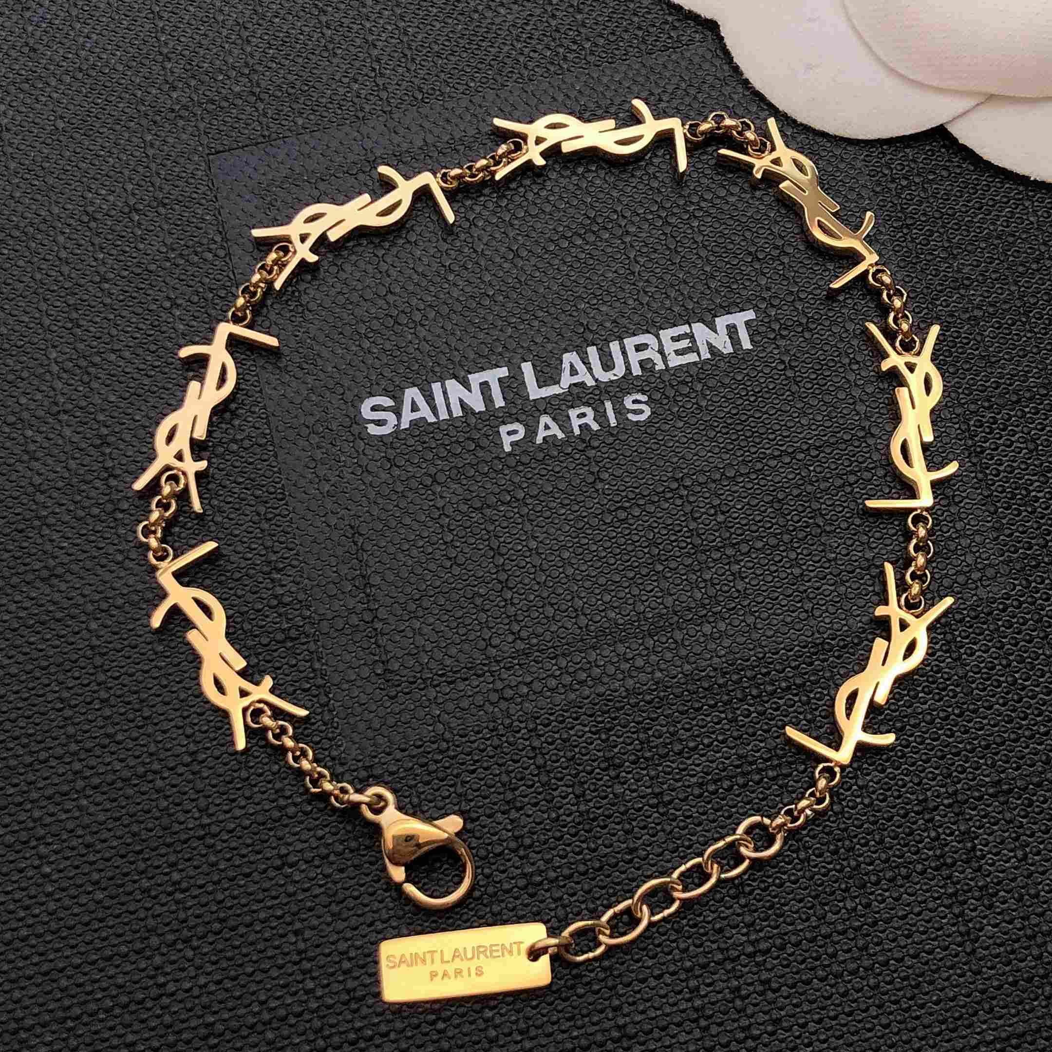 Saint Laurent Cassandre Multi-charm Bracelet In Metal - DopestKickz
