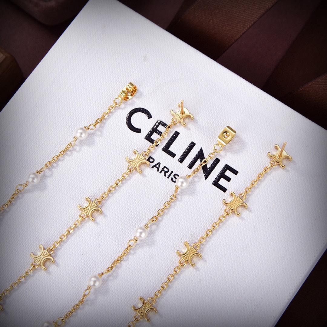 Celine Triomphe Long Pearl Earrings In Brass With Gold Finish And Resin Pearls - DopestKickz