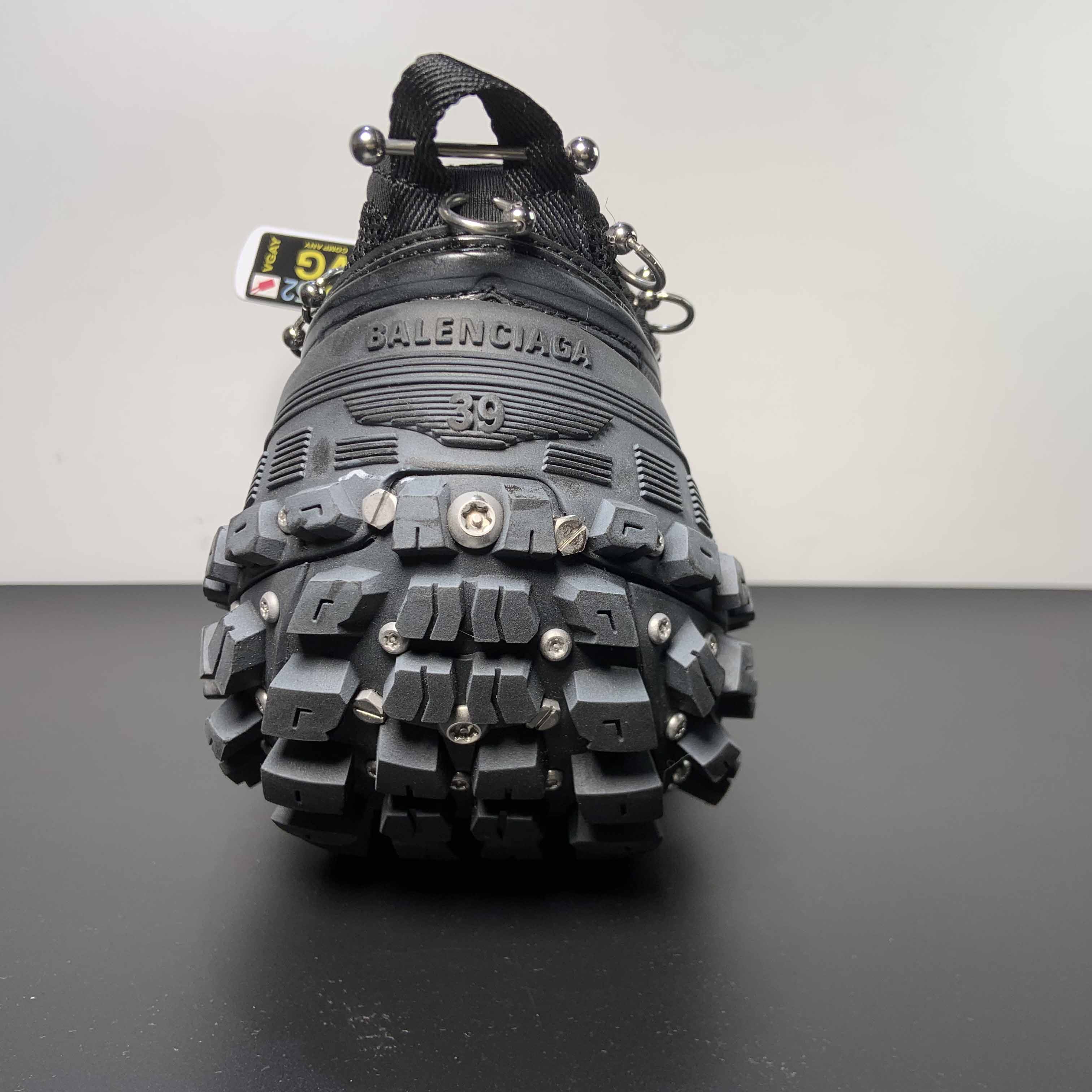 Balenciaga Bouncer Screw Sneaker With Piercings In Black - DopestKickz