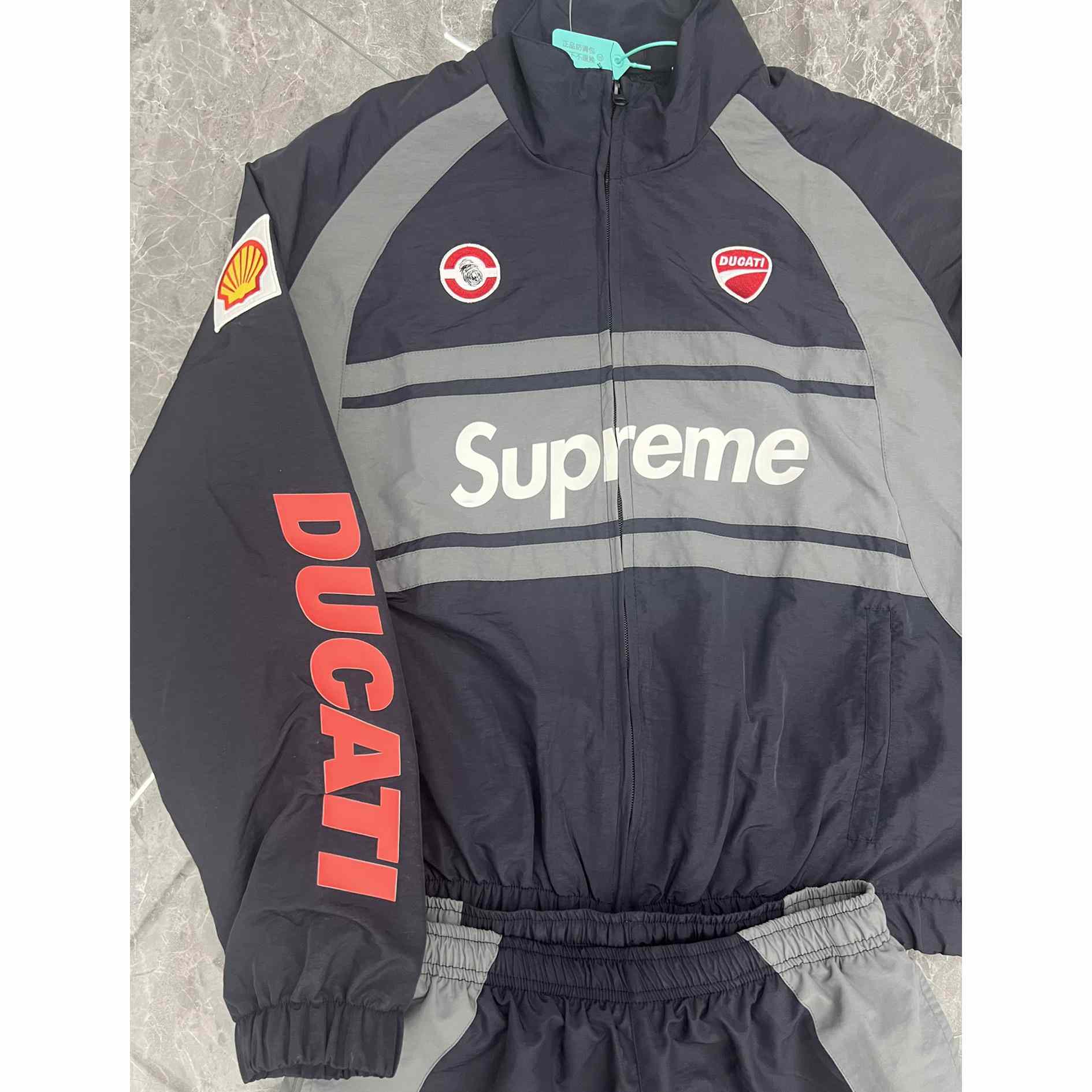 Supreme x Ducati Tracksuit - DopestKickz