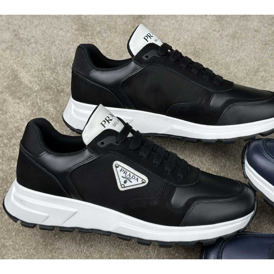 Prada Leather And Re-Nylon Sneakers - DopestKickz