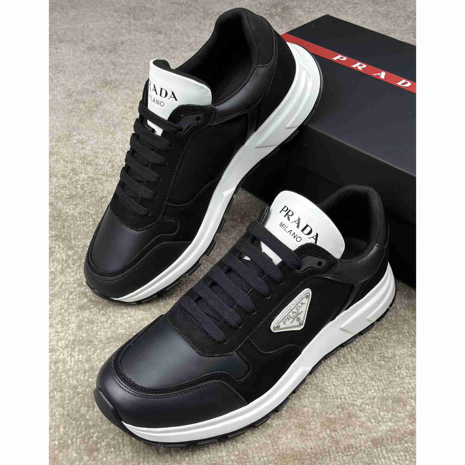 Prada Leather And Re-Nylon Sneakers - DopestKickz