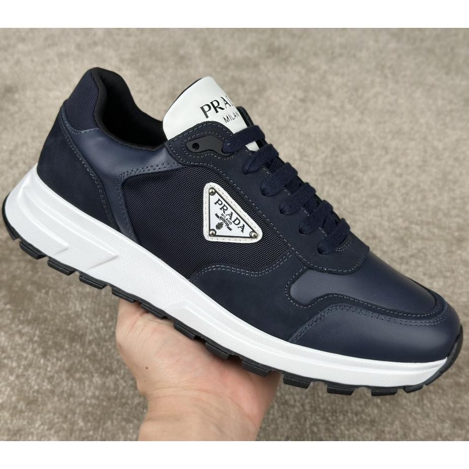 Prada Leather And Re-Nylon Sneakers - DopestKickz