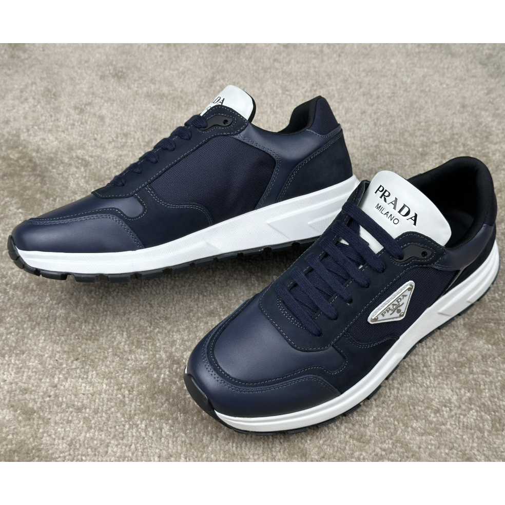 Prada Leather And Re-Nylon Sneakers - DopestKickz