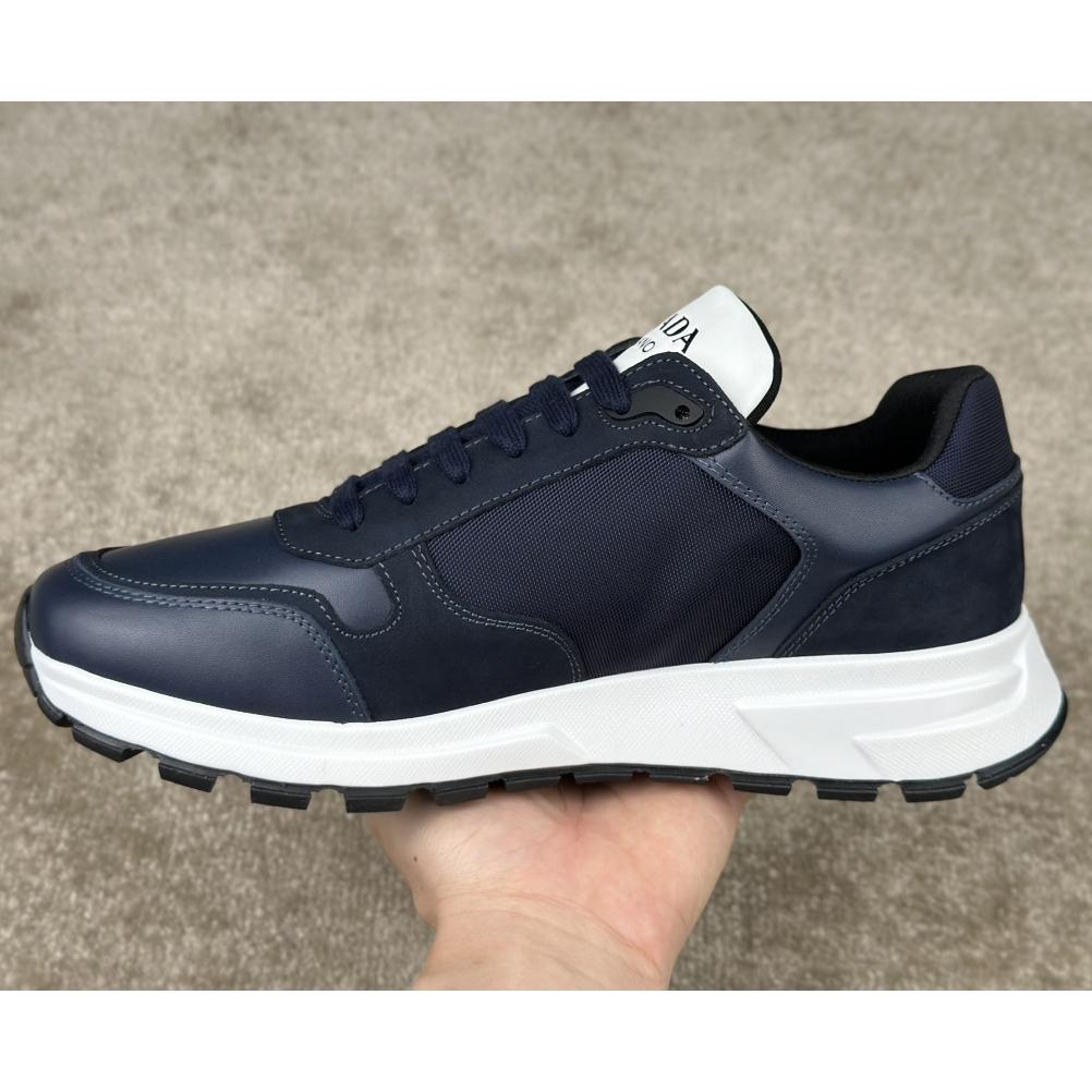 Prada Leather And Re-Nylon Sneakers - DopestKickz