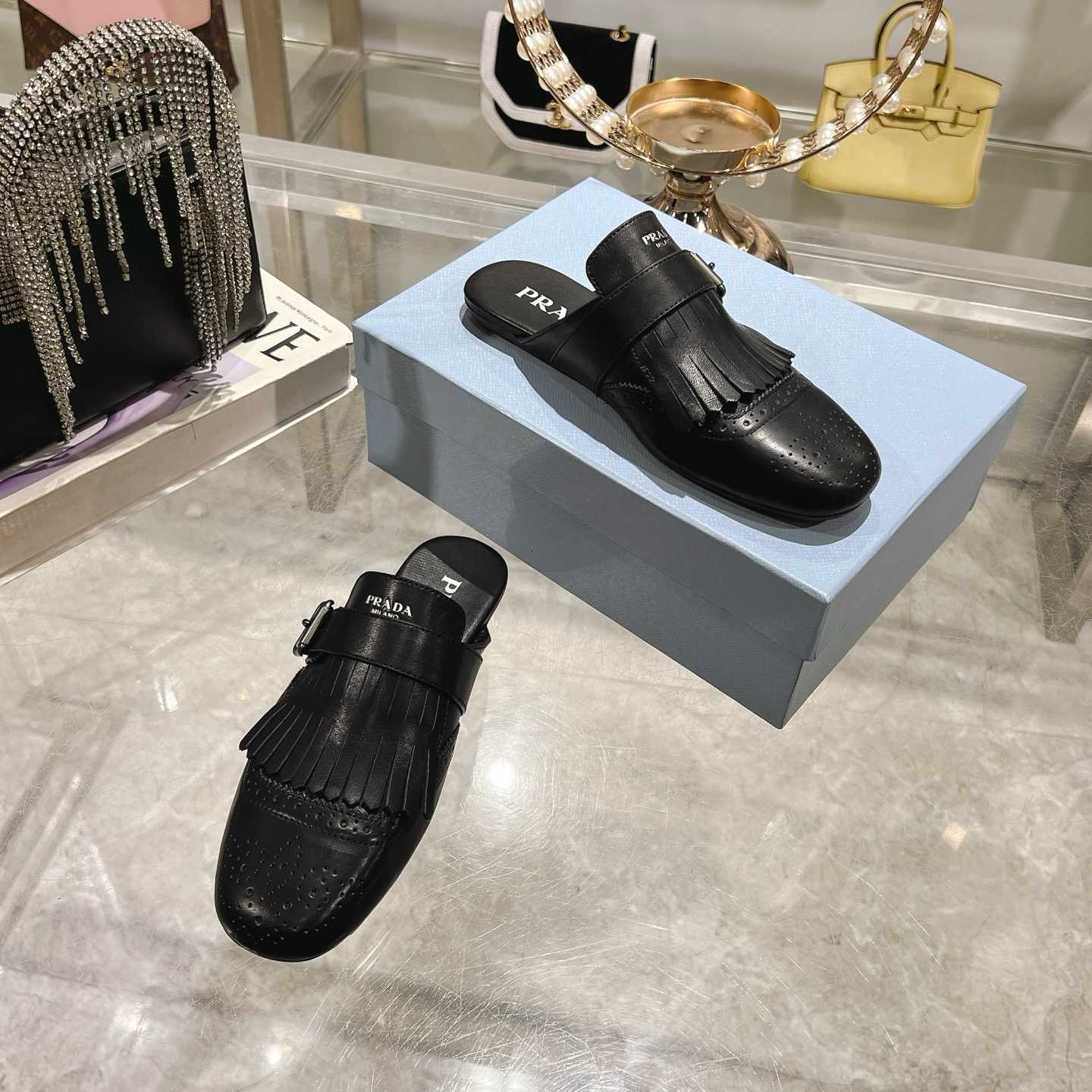Prada Shuffle Fringed Monk Strap Leather Mules - DopestKickz