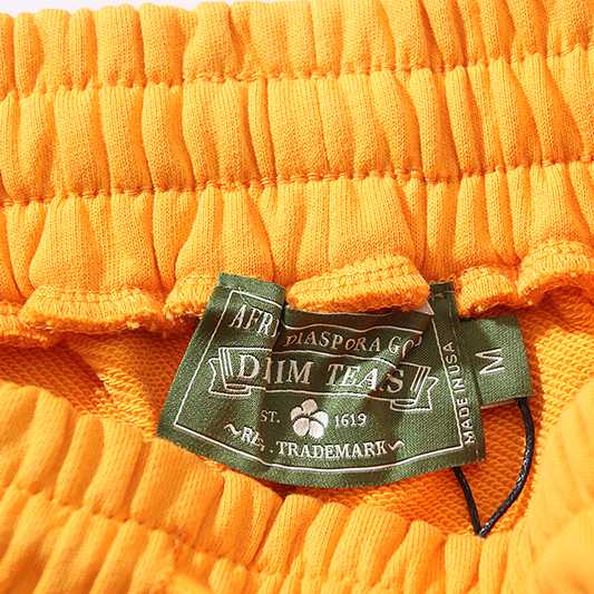 Denim Tears ADG Sweatpants Yellow - DopestKickz