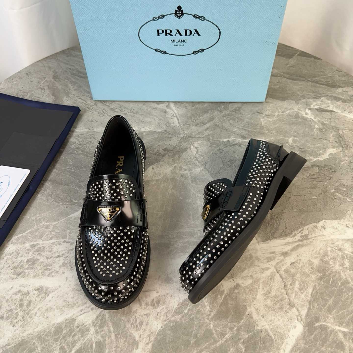 Prada Studded Brushed Leather Loafers - DopestKickz