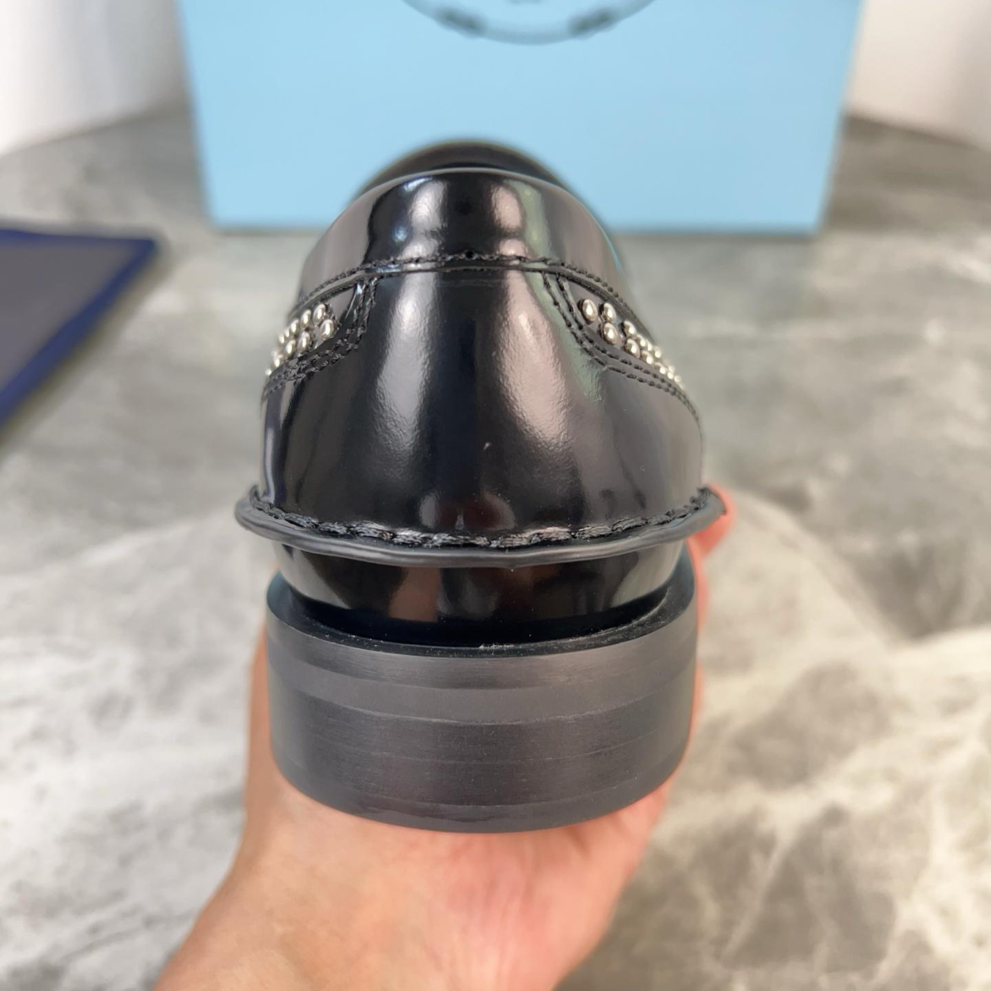 Prada Studded Brushed Leather Loafers - DopestKickz