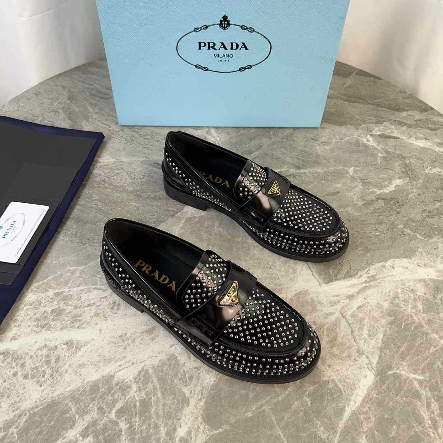 Prada Studded Brushed Leather Loafers - DopestKickz