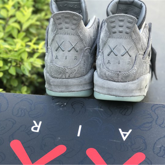 KAWS x Air Jordan 4 “Cool Grey”      - DopestKickz